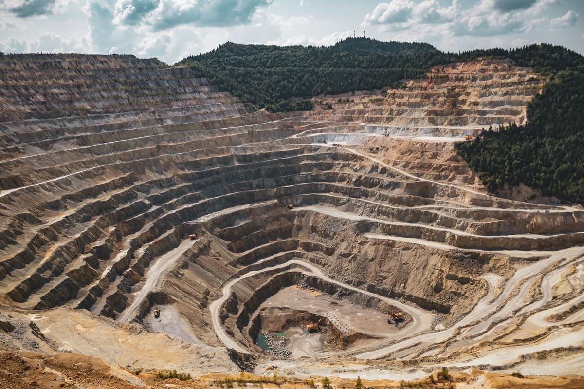 Terraced benches of an open-pit mine